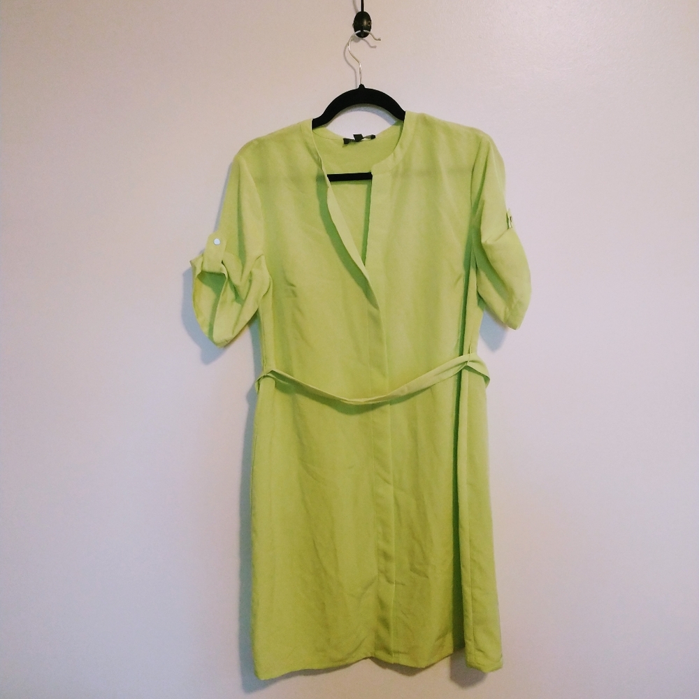 The Limited line green shift dress with short sleeves and matching belt.  Size 6